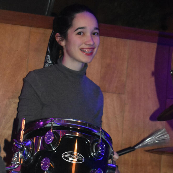 Me in one of the acoustic jams playing the drums.